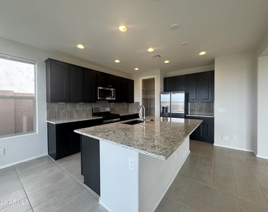 7053 W Oberlin Way - Photo Thumbnail 10