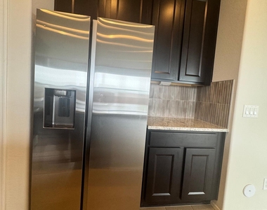7053 W Oberlin Way - Photo Thumbnail 6