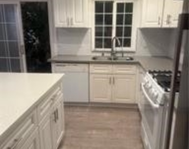 7615 Glade Avenue - Photo Thumbnail 3