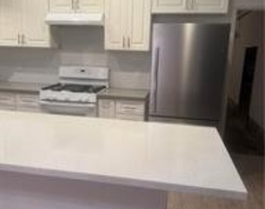 7615 Glade Avenue - Photo Thumbnail 4