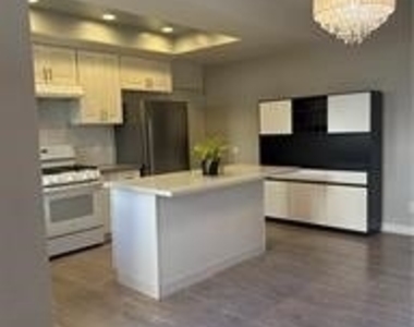 7615 Glade Avenue - Photo Thumbnail 1