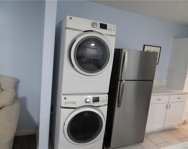 3923 S South  Normandie Avenue - Photo Thumbnail 1