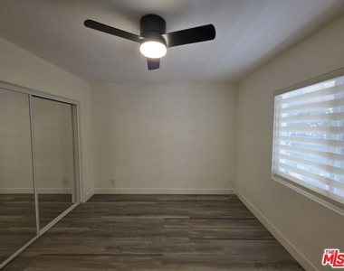 3707 S Canfield Avenue - Photo Thumbnail 3
