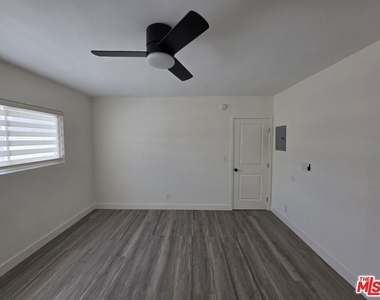 3707 S Canfield Avenue - Photo Thumbnail 2