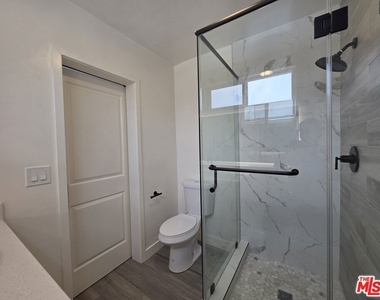 3707 S Canfield Avenue - Photo Thumbnail 6