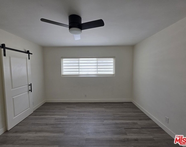 3707 S Canfield Avenue - Photo Thumbnail 1