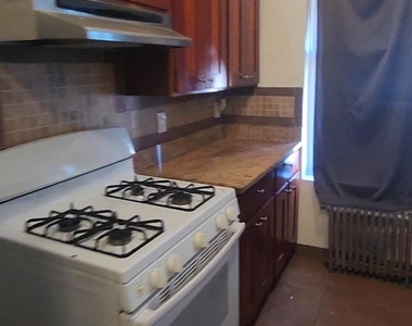 120-15 Jamaica Ave - Photo Thumbnail 1