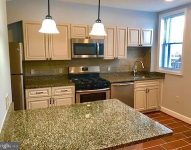 635 Kenyon Street Nw - Photo Thumbnail 1