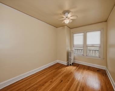 6719 N Oshkosh Avenue - Photo Thumbnail 1