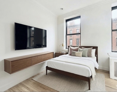 338 East 55th Street - Photo Thumbnail 3