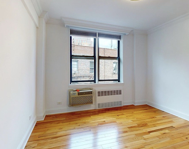 305 West 13th Street - Photo Thumbnail 2