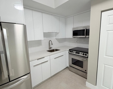 1390 W 37th Street - Photo Thumbnail 2