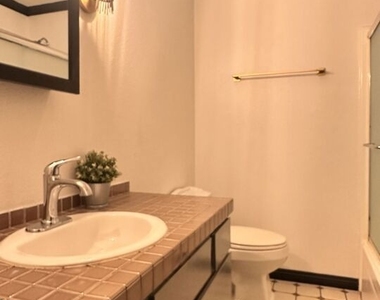 1131 Alta Loma Road - Photo Thumbnail 9