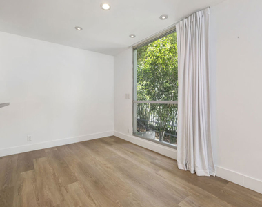 1100 Alta Loma - Photo Thumbnail 13