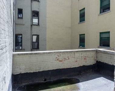 East 100th Street - Photo Thumbnail 6