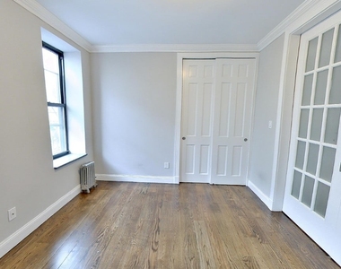 East 100th Street - Photo Thumbnail 5