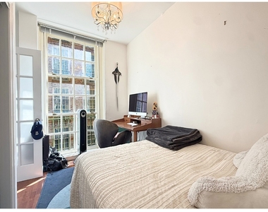 516 E 78th Street - Photo Thumbnail 4