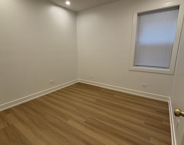 6042 S Eberhart Avenue - Photo Thumbnail 13