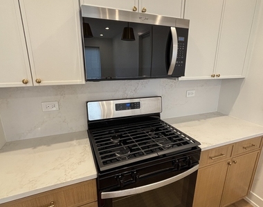 6042 S Eberhart Avenue - Photo Thumbnail 6