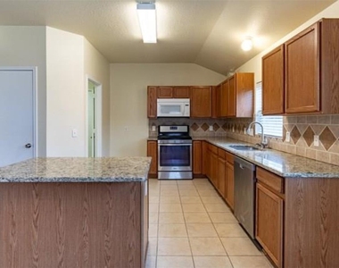 10446 Caribou Cove - Photo Thumbnail 4