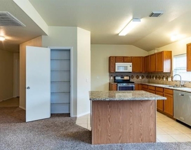 10446 Caribou Cove - Photo Thumbnail 2