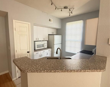 6316 Raleigh Street - Photo Thumbnail 5