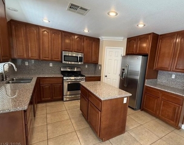 5565 Golden Palms Court - Photo Thumbnail 2