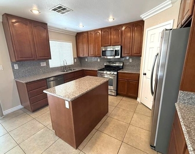 5565 Golden Palms Court - Photo Thumbnail 3