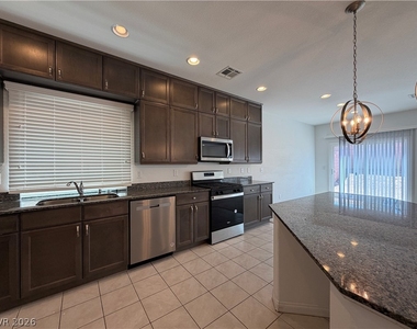 7869 Tyrell Peaks Street - Photo Thumbnail 7