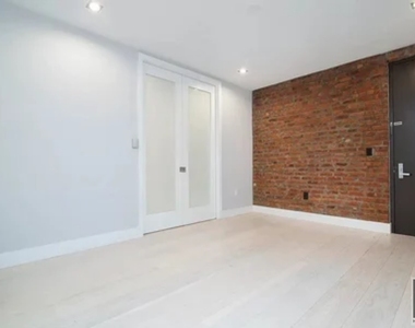 East 13 Street - Photo Thumbnail 3