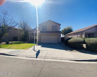 7203 W Irma Lane - Photo Thumbnail 1
