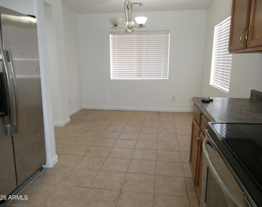 11547 W Schleifer Drive - Photo Thumbnail 4