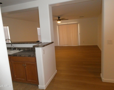 11547 W Schleifer Drive - Photo Thumbnail 1