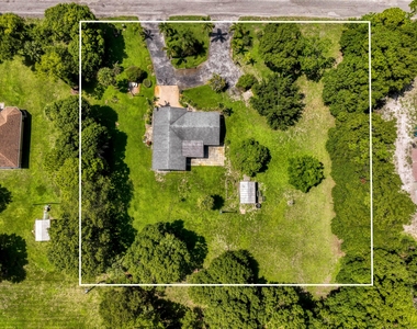 7107 181st Street N - Photo Thumbnail 1