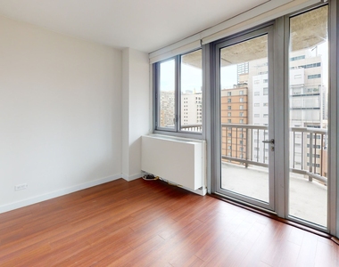 401 E 34th St - Photo Thumbnail 3