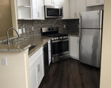 10766 Sabre Hill Dr - Photo Thumbnail 3