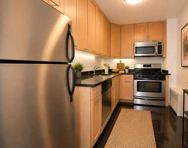E 49th Street - Photo Thumbnail 1