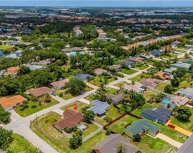 9084 Caloosa Road - Photo Thumbnail 4