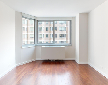401 E 34th St - Photo Thumbnail 1