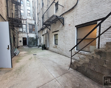 East 13th Street - Photo Thumbnail 1