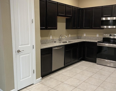 1367 S Country Club Drive - Photo Thumbnail 4