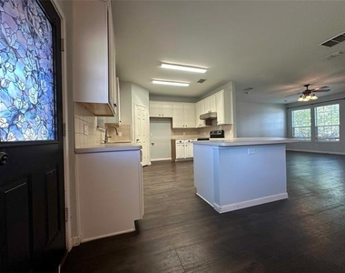 1909 Bradford Pear Square - Photo Thumbnail 3