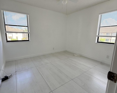7714 Tahiti Lane - Photo Thumbnail 12
