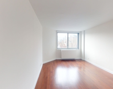 401 E 34th St - Photo Thumbnail 1