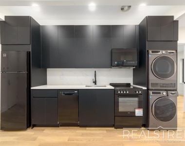 1406 Lincoln Pl - Photo Thumbnail 2