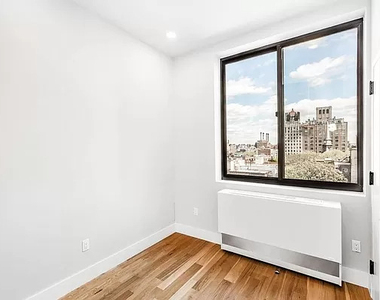 101 E 10th Street - Photo Thumbnail 3