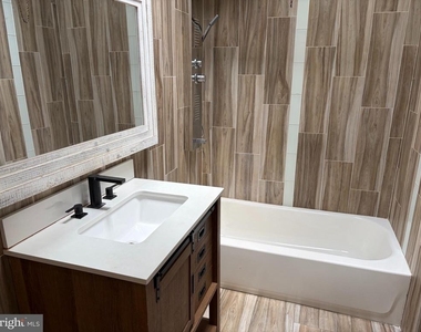 141 S 57th Street - Photo Thumbnail 6