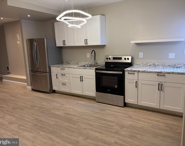 141 S 57th Street - Photo Thumbnail 2