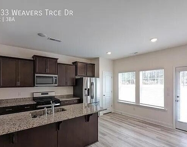 1233 Weavers Trace Drive - Photo Thumbnail 2