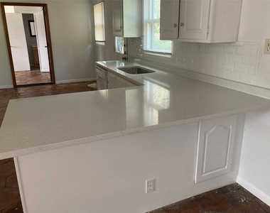 7702 Pitter Pat Ln - Photo Thumbnail 1